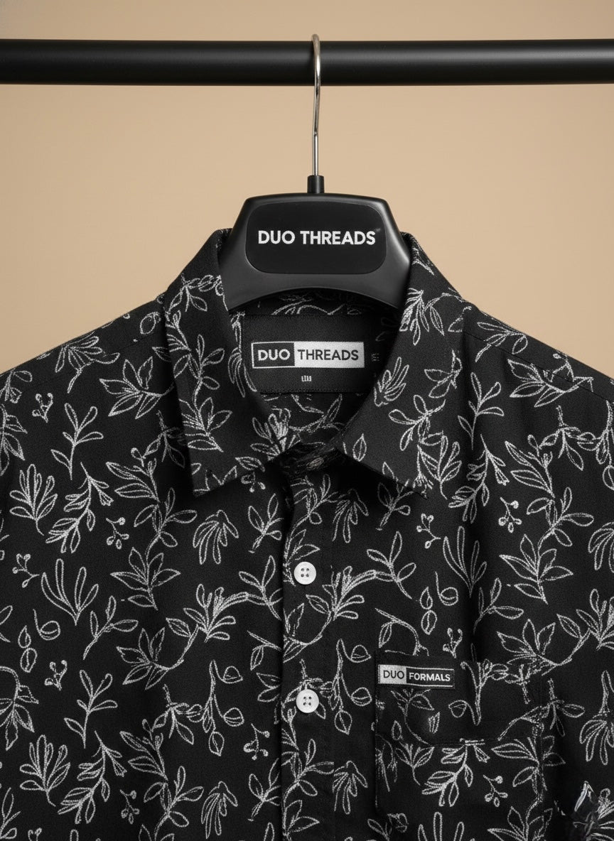 WHITE FLORAL ON BLACK SHIRT